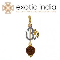 Shaivite Trident-Aum-Rudraksha Pendant With Silvery Gems and 18 K Gold

This Shaivite pendant is quite the thing to go into your jewelry box if you are a devotee of Shiva. Fashioned from gold and drawn into the deity's signature trishool (trident), it is studded with motifs that substitute for the very image of Shiva. A big brown rudraksha is inserted between two gold sheaves at the base of the trishool. Along the stem of the trishool is a sacred syllable carving of the aum that is studded with glittering silvery gems. Zoom in on the body of the syllable to gauge the gold make of the foundation.

Shaivite Pendant: https://www.exoticindiaart.com/product/jewelry/shaivite-trident-aum-rudraksha-pendant-with-silvery-gems-lbn31/

Pendants: https://www.exoticindiaart.com/jewelry/hindu/pendants/

Hindu Pendants: https://www.exoticindiaart.com/jewelry/hindu/

Jewelry: https://www.exoticindiaart.com/jewelry/

#jewelry #fashion #rudrakshapendant #shaivitependent #18kgoldpendant #religiouspendant #hindupendant #ompendant #pendantwithtrident
