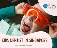 It is highly recommended to schedule a visit to your dentist for your child as the child's tooth appears. The normal problems of kids are tooth decay and the earlier the visit to a kids dentist will help to prevent further problems. Your child may be nervous of the first visit to a dentist, parents should ease out the fear in children and book an appointment with a kids dentist in Singapore to make the visit happy. At coast dental, we help the kids to get comfortable with the environment before moving to the dental area. Our friendly doctors make the environment comfy for your kids and proceed with the treatment.  