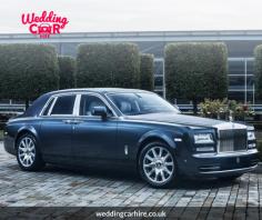 Your wedding day is a momentous occasion, filled with love, joy, and the beginning of a beautiful journey. To make this day even more memorable and extraordinary, every detail should reflect elegance and luxury. One way to achieve this is by opting for Rolls Royce Phantom hire from Wedding Car Hire. Renowned for their timeless beauty and opulent features, Rolls Royce Phantoms offer a regal and sophisticated touch to your wedding transportation.

Unparalleled Luxury: Rolls Royce is synonymous with luxury, and the Phantom model exemplifies this reputation. With its sleek lines, iconic grille, and distinguished presence, the Phantom exudes elegance and sophistication. The meticulously crafted interior boasts plush leather seating, handcrafted wood accents, and cutting-edge technology, providing you with the ultimate luxurious experience on your special day.

Captivating Style: Arriving in a Rolls Royce Phantom is a statement of style and grace. This iconic vehicle effortlessly commands attention and leaves a lasting impression. Its classic design, coupled with the Spirit of Ecstasy hood ornament, creates a captivating sight that symbolizes the union of timeless beauty and contemporary excellence. The Phantom's presence will enhance the overall aesthetic of your wedding and make for stunning photo opportunities.

Comfort and Spaciousness: On your wedding day, comfort is paramount. The Rolls Royce Phantom hire a spacious and indulgent interior, ensuring a relaxed and enjoyable journey. The rear seating provides ample legroom, allowing you to arrive at your destination feeling refreshed and ready to embrace the festivities ahead. The Phantom's advanced suspension system ensures a smooth and quiet ride, adding to your overall comfort and enjoyment.

Professional Chauffeur Service: Rolls Royce Phantom hire from Wedding Car Hire includes the services of a professional chauffeur. These experienced and impeccably dressed individuals are trained to provide top-notch customer service, ensuring a seamless and stress-free transportation experience. From opening doors to assisting with your needs, the chauffeur will cater to your every requirement, allowing you to focus on creating beautiful memories.

Unforgettable Memories: Your wedding day is a collection of cherished moments, and the choice of transportation can significantly contribute to those memories. Riding in a Rolls Royce Phantom creates an atmosphere of glamour and sophistication, making you feel like royalty. The experience of being chauffeured in such an iconic and luxurious car will leave an indelible mark on your wedding day, not only for you but also for your guests.

Choosing Rolls Royce Phantom hire from Wedding Car Hire ensures that your transportation embodies the epitome of luxury, style, and comfort. The timeless beauty and unmatched elegance of the Phantom will make a lasting impression and elevate your wedding experience to extraordinary heights. Indulge in the opulence of a Rolls Royce Phantom and create memories that will be cherished for a lifetime.