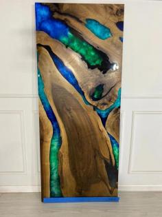 Introducing our remarkable Epoxy River Ocean Wooden Burn Door, a captivating fusion of natural wood and mesmerizing epoxy resin art. 

Visit us our Website  :- https://uniquehandicraftind.com/epoxy-burn-door-made-by-wooden-for-handmade-and-home-decor-door/