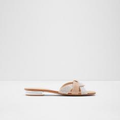 Explore a collection of comfortable flat sandals for women at ALDO Shoes UAE. Step into style and comfort with our range of trendy flat sandals for women.
