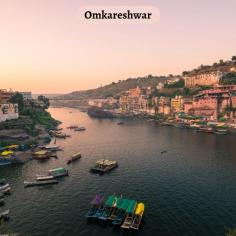 Omkareshwar, a sacred island on the Narmada River, houses ancient temples and is revered as one of India's holiest pilgrimage sites. 