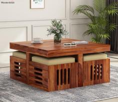 Buy Petlin Sheesham Wood Coffee Table with 4 Seating Stools (Honey Finish) Online at 54% OFF from Wooden Street. Explore our wide range of Coffee and Center Tables Online in India at best prices.