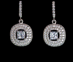 The Clara Drop Earrings are a statement making, yet subtle addition to any jewelry collection. Our Clara Halo dangles are sure to turn heads with their large 4 prong set center stones that are surrounded by sparkly, starlike pavé simulated diamonds.