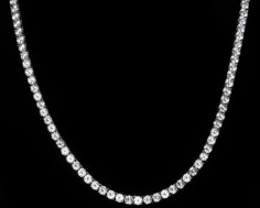 Our Lombard Riviere Necklace has Presence! It's Reminiscent of Old Hollywood Glamour and Sophistication. The Lombard Riviere features dazzling, graduated round cut simulated diamonds captured in a timeless bezel setting design.