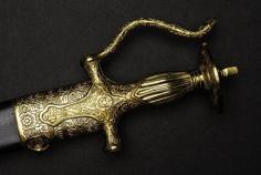 Typically forged from high-quality steel, the blade of the Sikh Kirpan symbolizes strength and resilience. The hilt, often made of brass or wood, signifies grounding and connection to nature. The scabbard, crafted with attention to detail, complements the blade and hilt, showcasing a seamless fusion of form and function.