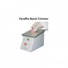 Paraffin block trimmer  is a microprocessor controlled unit. The equidistant grooves on the heated surface plane scrapes off the excess paraffin from the cassettes after specimen inclusion. The provision of removable drawer employs easy disposal of collected excess paraffin wax.

