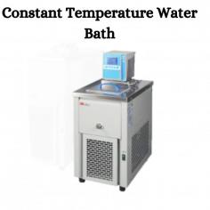 A constant temperature water bath is a laboratory device used to maintain a stable temperature for samples or experiments immersed in water. It consists of a container filled with water and a temperature control mechanism to regulate the temperature of the water.Many water baths come with safety features such as over-temperature protection and alarms to prevent overheating and ensure safe operation.
