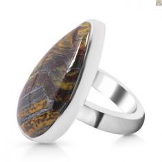 Iron Tiger Eye Jewelry: Its appearance roar loud with a wild energy

Iron Tiger Eye Gemstone perfectly fits in with its name and showcases unique tiger-striped type patterns. Its patterns and bands on its surface appear like a tiger's eye and exude vibrant golden, black, and brown colors. The stone belongs to the Chalcedony mineral class family and has a silky luster with opaque transparency. Its appearance roar loud with a wild energy that calls out to all the passionate jewelry lovers to wear it as Tiger Eye Jewelry and flaunt their inner strength boldly.