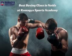 Ramagya Sports Academy (Best boxing class in Noida) stands out as one of the best boxing classes in Noida. Renowned for its commitment to excellence and holistic development, the academy offers world-class training facilities and expert coaching staff. With a focus on technical proficiency, physical fitness, and mental discipline, Ramagya Sports Academy provides aspiring boxers with a nurturing environment to hone their skills and unleash their full potential. The academy's comprehensive training programs cater to individuals of all ages and skill levels, from beginners to seasoned athletes. Through a combination of rigorous training sessions, sparring drills, and personalized coaching, students at Ramagya Sports Academy develop not only as athletes but also as disciplined individuals capable of facing life's challenges with confidence and determination.
 
