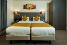 Plaza Executive Double Room is fully furnished with twin bed, desk, ironing board, in-room safe. Book now and enjoy a luxurious stay!