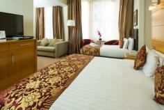 Plaza Executive Triple Rooms in London is fully furnished with double and single bed, Plasma TV, kettle, refrigerator, complimentary still/sparkling water etc