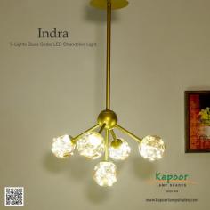 Introducing the Indra 5-Lights Glass Globe LED Chandelier Light! This stunning chandelier is the perfect blend of modern sophistication and timeless charm, designed to elevate any room with its warm, inviting glow. Transform your space with the radiance of Indra. Because your home deserves the best!