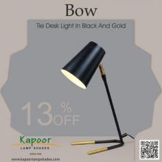 Add a touch of sophistication to your desk with the sleek and stylish Bow Tie Desk Light in Black and Gold. This isn't just a lamp – it's a statement of elegance and functionality. The black and gold finish adds a luxurious touch to any room. Shop Bow Tie Desk Light in Black and Gold now and get 13% off.