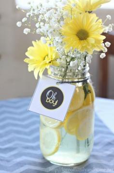 Gray & Yellow Baby Shower Decorating Ideas. Easy centerpieces with lemon slices, baby's breath, & yellow mum daisies. Cheap, easy, & beautiful.