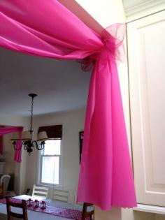 Use $1 plastic tablecloths to decorate doorways and windows for parties, etc..