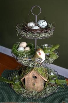 Cute spring centerpiece - 3 tiered wire with birdhouse, bird, nests, eggs, moss, etc. love the way the little nest/wreath fits in top tier - cute spring display! byme.kelly via MyStyleShare