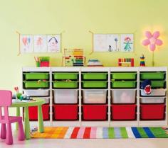 ikea playroom storage - I really need to do this in Sander's room. Looks way nicer than the various items I have tossed around his room to store toys...