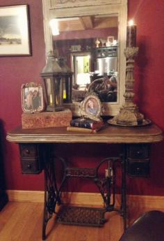 Repurposed antique Singer sewing machine with concrete table top