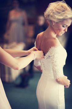 Sleeves, lace, and the veil :)