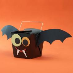 Bat Favor Boxes - Hand out these friendly bats at a Halloween party or on trick-or-treat night. To make, attach cardstock cut in the shape of wings to a premade take-out carton (available at crafts stores). Cut out colored cardstock for the eyes, mouth, and fangs; adhere with glue. Fill the box with yummy Halloween treats.