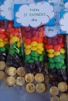 use different colored skittles to create the rainbow over a pot of gold (rolos)