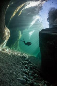 Diving in Verzasca River, Switzerland