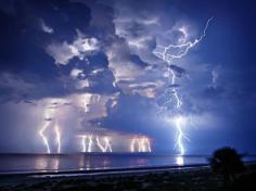 Summer Storm by Ed Hetherington on 500px. "A late summer storm over the Atlantic Ocean in Hilton Head, South Carolina. The different color temperature of the bolts were how they actually looked. It seemed as though the bolts that were in rainy areas had a warmer color to them."