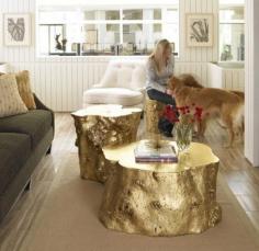 Spray painted tree trunk as a coffee table. ive been asking taylor for one of these!