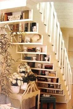 Display your book collection under the stairs. | 31 Insanely Clever Remodeling Ideas For Your New Home