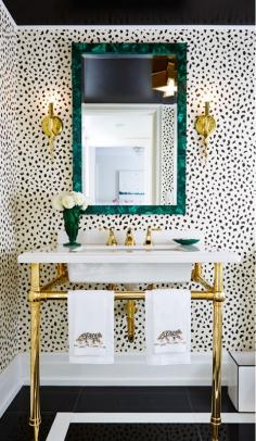Black, white and spotted all over.  Powder rooms make the perfect place to let loose and have fun with your design.  Becau...