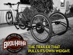 This is the electric assist Brouhaha cargo trailer. The assist adjusts depending on how much load you are carrying so that is creates zero towing force on your bike. More info: www.kickstarter.c...