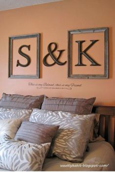 Love the framed initials above the bed.