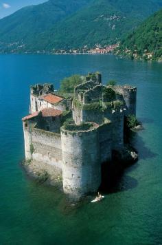 The Castles of Cannero are today picturesque ruins on two rocky islets close to the shore of Lago Maggiore, Italy. They are all that remains of the Rocca Vitaliana fortress built between 1519 and 1521 by Ludovico Borromeo, who gave it this name in honour of an illustrious ancestor.