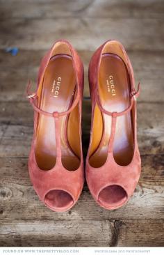 Burnt-orange Gucci pumps.