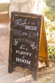 I love this alternative "sit anywhere" rustic wedding sign-change to "here for the bride? Here for the groom?" Since there is family too