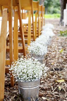 If you're keen on having real flowers, try using baby's breath. | 11 Ways To Make Your Wedding More Beautiful On A Budget