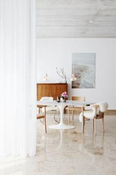 Home Tour: Ladylike Scandinavian Simplicity// sheepskin, Saarinen table marble floor