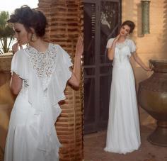 1.High quality, low price 2.No MOQ 3.Free shipping. 2014 Fashion Beach Jewel Neck Short Sleeve Lace Corset Sheer Back A-line Chiffon Beautiful Bridal Gowns Vintage Wedding Dresses