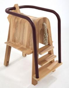 great idea! Toddler high chair by TAMASINE OSHER Play Saddle Seat Play Saddle Seat is a rear access, toddler high chair that can be used safely by a young child without adult help or supervision. It allows independence for both child and parent in a safe and fun way. For the child, it is special and unique, giving independence to safely mount and alight at will. Materials: Ash wood and leather