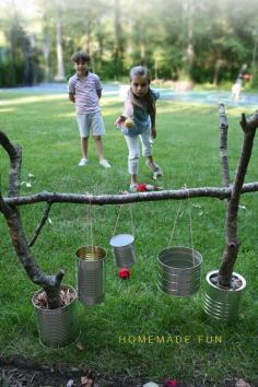 This DIY backyard toss game is made out of tree branches, aluminum cans, string and yarn. How clever! - tomorrows adventures