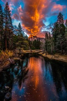 "The Eruption" (blazing sunset reflects in calm waters, Half Dome, Yosemite National Park, California)