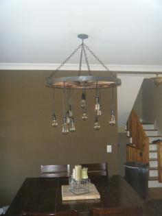 Wagon wheel chandelier with Edison bulbs by TheHoneydew on Etsy, $345.00