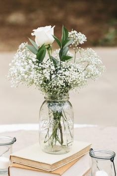 Baby's breath and roses in a mason jar—a simple, affordable wedding centerpiece {Photo by J. Masciana Photography via Project Wedding}