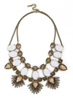 Bold meets beautiful in this knockout statement necklace. With its outrageously oversized gems and subtle phoenix inspiration, it's a complete head-turner.