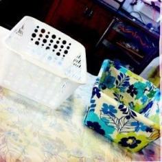 Dollar Store Bins covered with fabric using hot glue (no sewing needed). Love this idea!