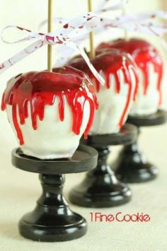 Blood Dripping Candy Apples Made with lots of red food coloring, apples and surprise – white chocolate, these candy apples will have the kids shrieking with delight, and the adults loving the grossness.