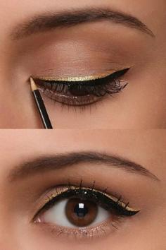 Adding metallic liner above usual black liner makes a perfect evening look.