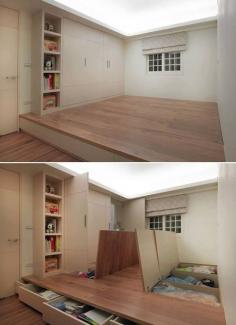 A platform in a storage/guestroom hides away all of your stuff while keeping the room usable. | 31 Insanely Clever Remodeling Ideas For Your New Home