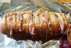 Ham  Cheese Pull-Apart Perfection. You will need a loaf of un-sliced, Italian bread, 3 tbsp of softened butter or margarine, 1 tbsp of Dijon mustard, 6 slices of Swiss cheese, and about 11oz of thinly sliced, fully cooked ham.